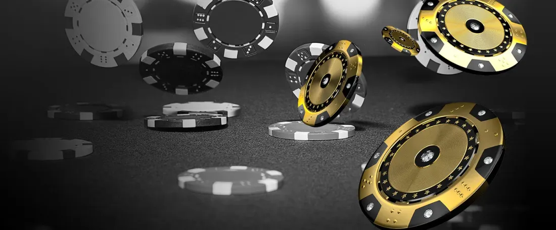Gold casino chips representing Villento Casino Rewards points